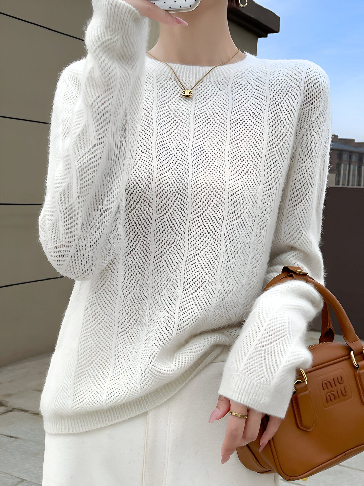 Mika™ - Merino wool sweater with elegant cutouts